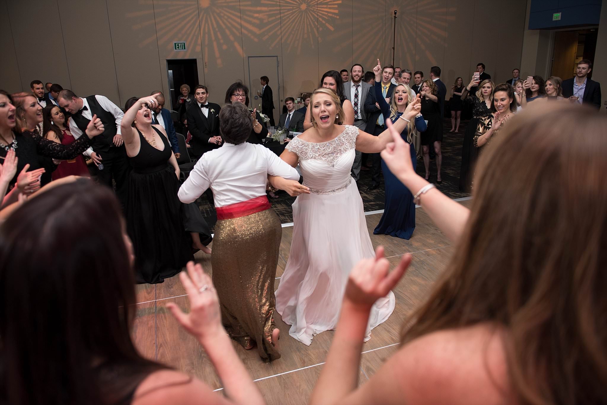 Winter Wedding at St. Mary Catholic Church  the Commodore Ballroom at Vanderbuilt University featuring an Alpha Delta Pi bride and Phi Delta Theta groom. Photography by Ivory Door Studio